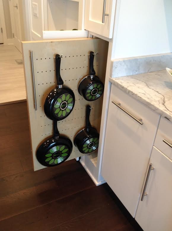 Enclosed kitchen - mid-sized transitional dark wood floor and brown floor enclosed kitchen idea with flat-panel cabinets, white cabinets, marble countertops, white backsplash, stone slab backsplash and no island