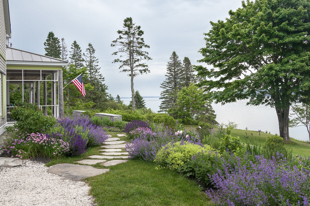 This is an example of a beach style backyard garden in Portland Maine.