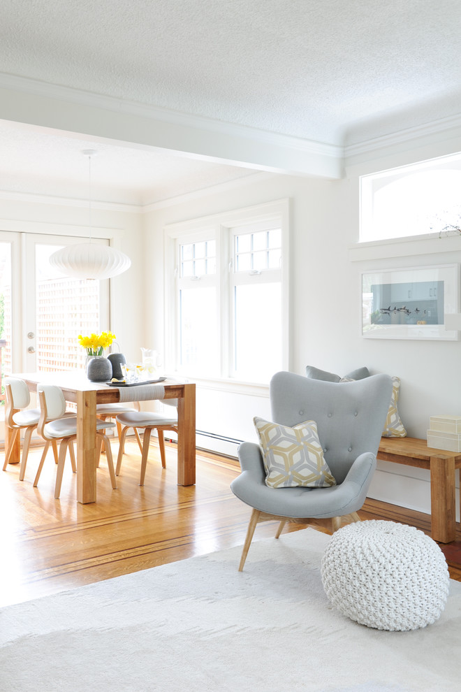 Kitchen/dining room combo - small 1960s medium tone wood floor kitchen/dining room combo idea in Vancouver with white walls and no fireplace