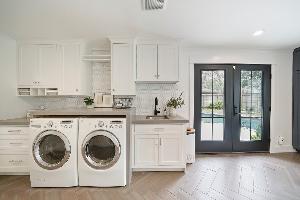 Design ideas for a contemporary laundry room in Houston.