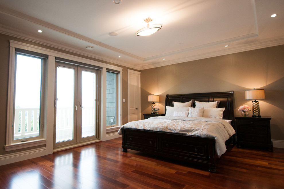 This is an example of a large asian master bedroom in Vancouver.