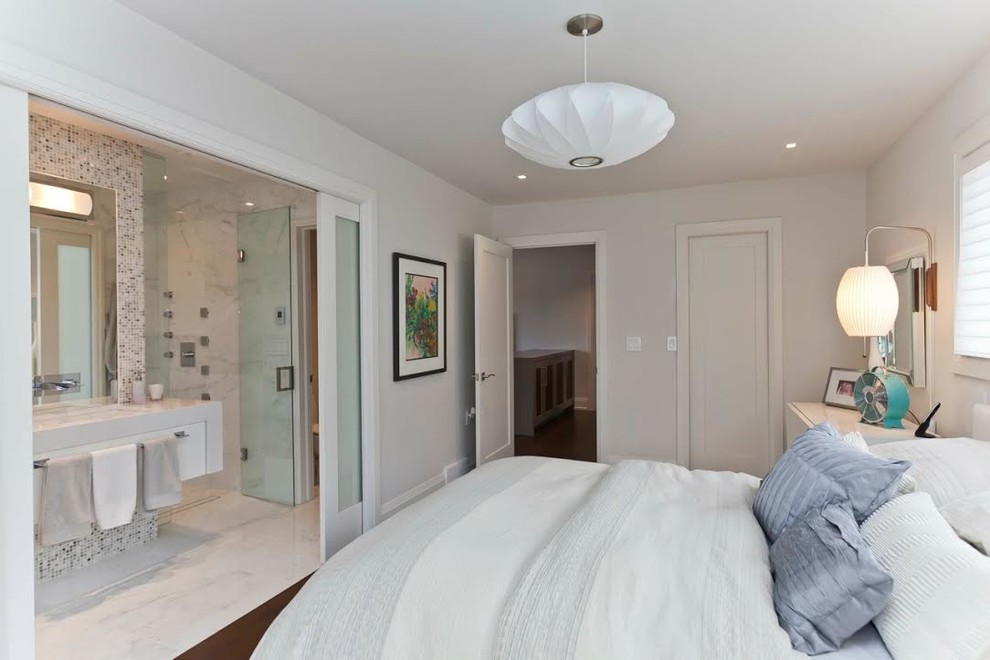 Photo of a contemporary master bedroom in Huntington with white walls and dark hardwood floors.