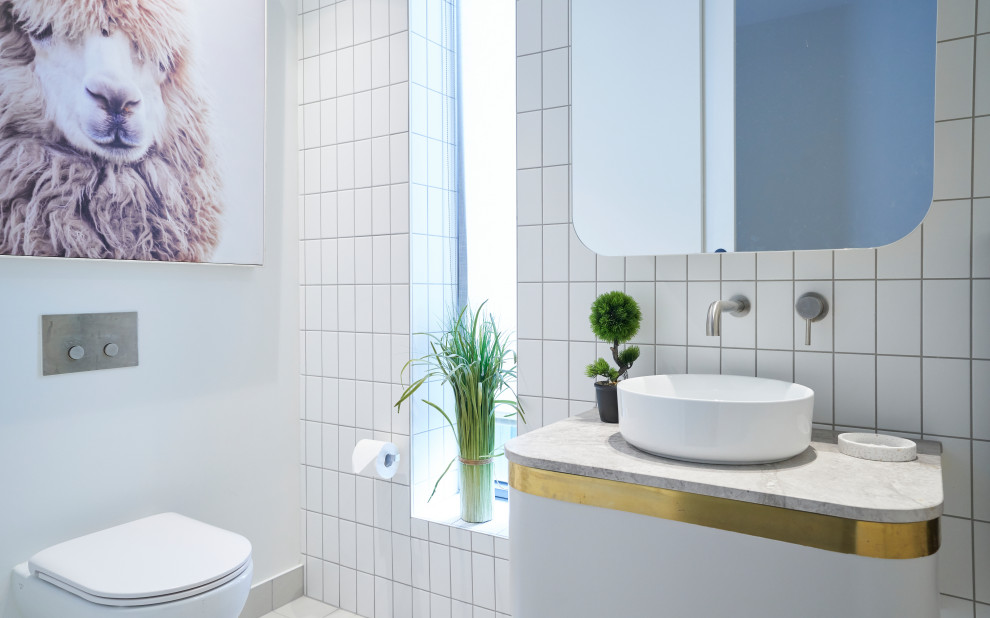 Mid-sized contemporary 3/4 bathroom in Melbourne with furniture-like cabinets, white cabinets, white tile, medium hardwood floors, engineered quartz benchtops, a single vanity and a floating vanity.