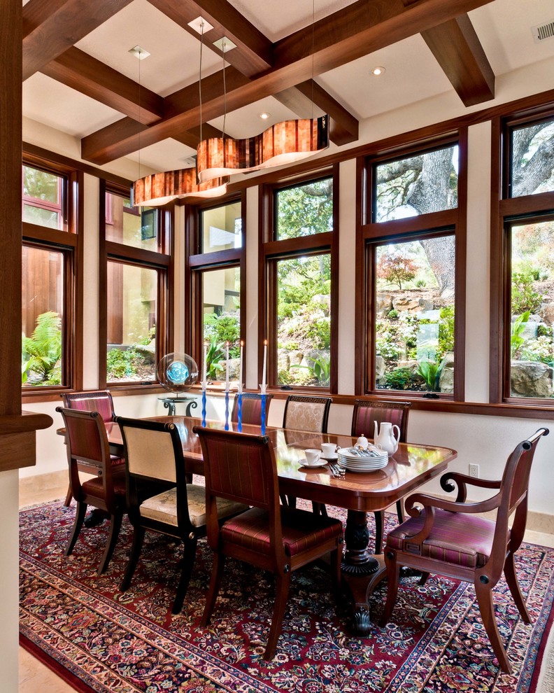 This is an example of a traditional separate dining room in San Francisco with white walls.
