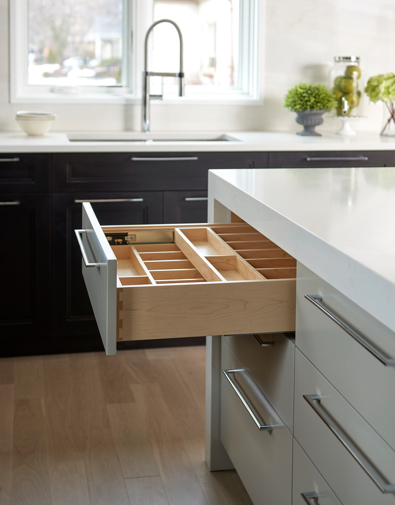 Example of a transitional kitchen design in Toronto
