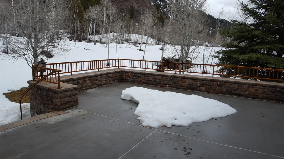 Deck - large rustic backyard deck idea with no cover