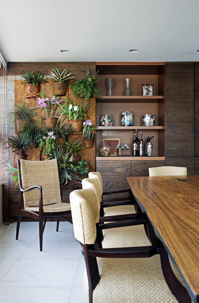 Contemporary dining room in Other with brown walls.