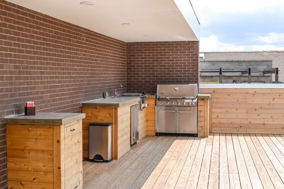 Inspiration for a large contemporary rooftop deck in Chicago with a fire feature and no cover.