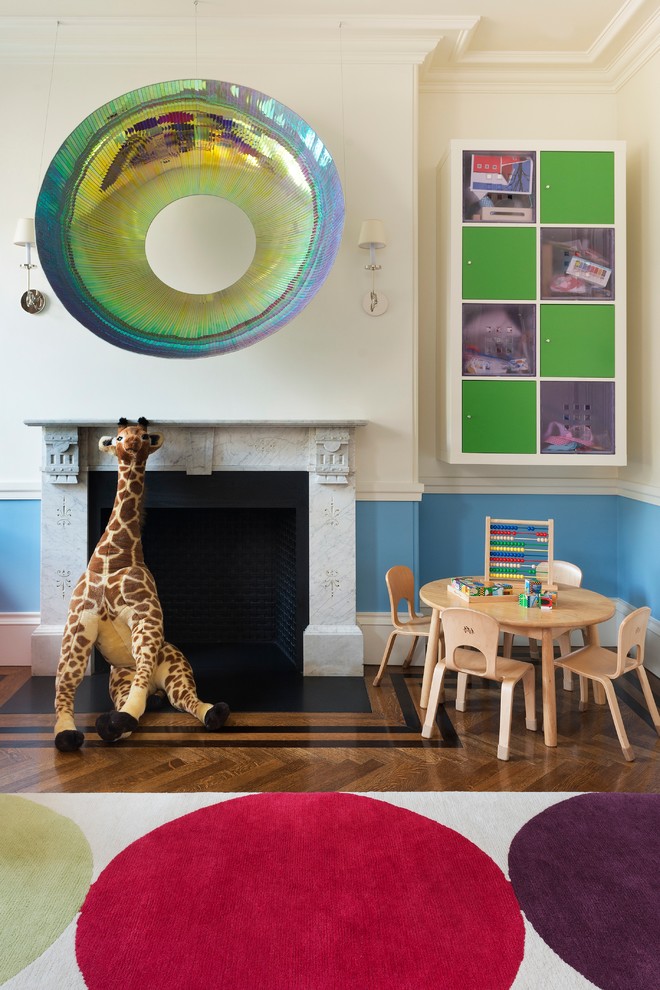 Inspiration for an eclectic gender-neutral kids' room in Boston with multi-coloured walls and medium hardwood floors.