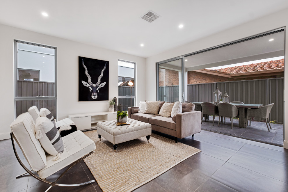 Mid-sized contemporary open concept living room in Adelaide with white walls, ceramic floors and grey floor.