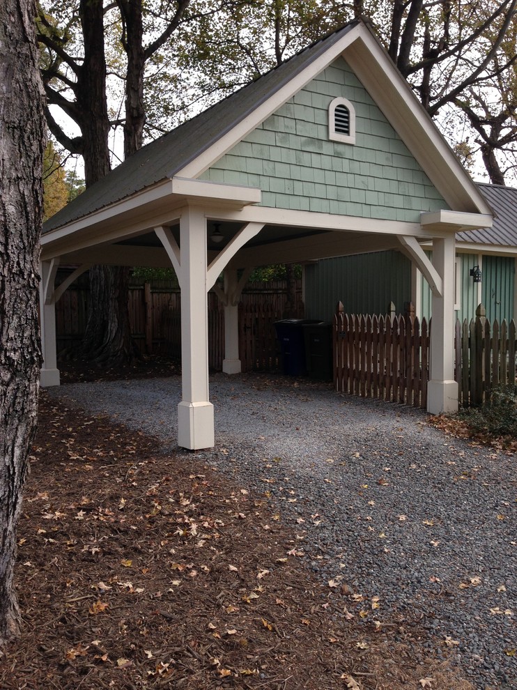 Large traditional detached one-car carport in Other.