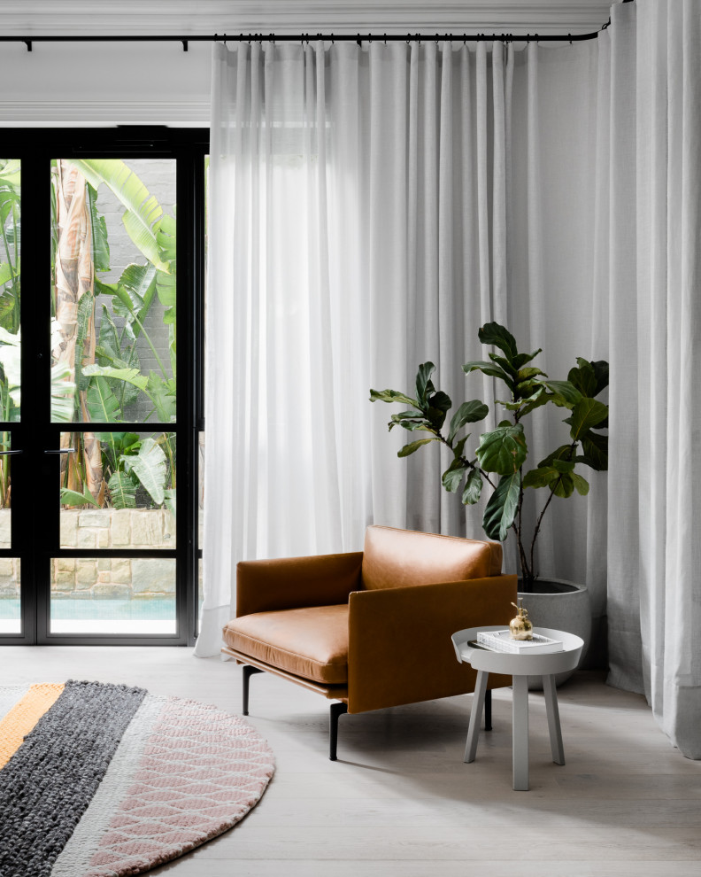 Design ideas for a contemporary living room in Melbourne.