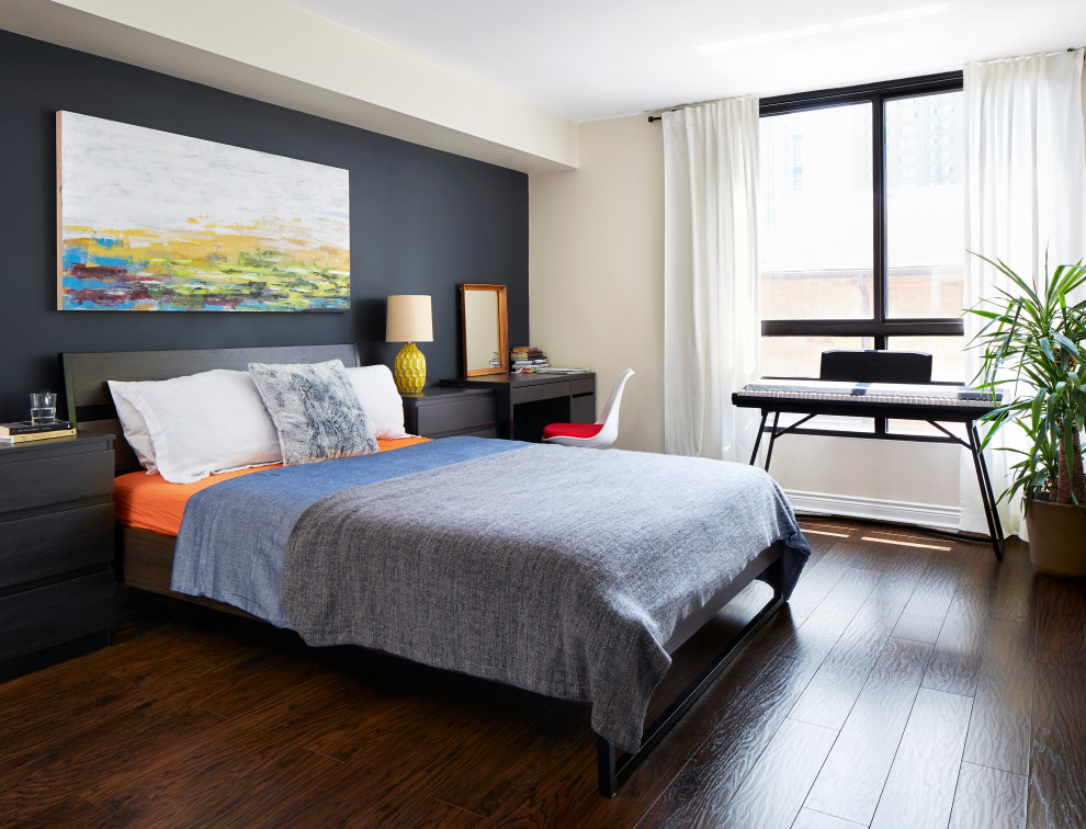 Photo of a medium sized contemporary master bedroom in Toronto with blue walls, dark hardwood flooring and brown floors.