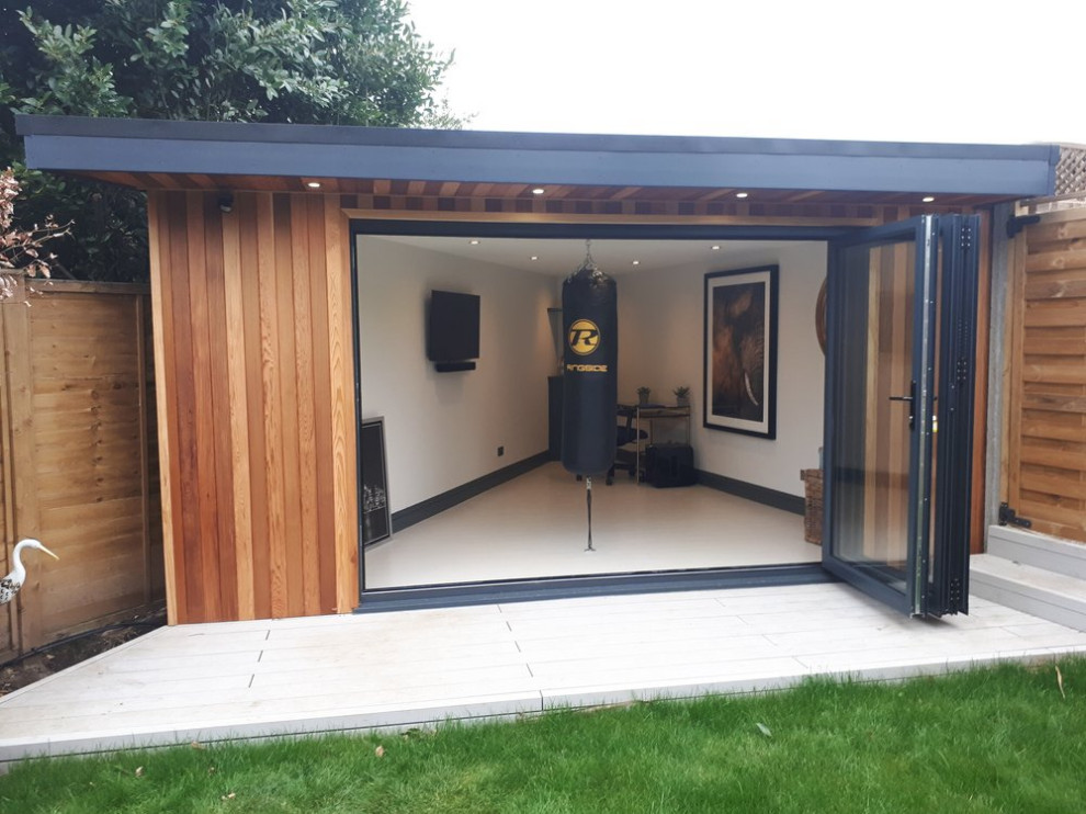 Inspiration for a medium sized contemporary garden shed and building in Surrey.