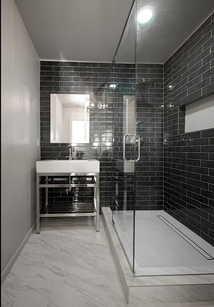 Inspiration for a small modern kids bathroom in Other with furniture-like cabinets, a corner shower, a two-piece toilet, black tile, ceramic tile, grey walls, marble floors, a console sink, grey floor and a hinged shower door.
