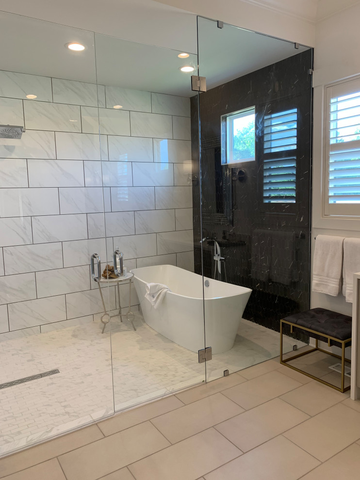 Transitional master black and white tile and ceramic tile ceramic tile and double-sink bathroom photo in Charlotte with furniture-like cabinets, beige cabinets, a one-piece toilet, an undermount sink, quartzite countertops, a hinged shower door, white countertops and a built-in vanity