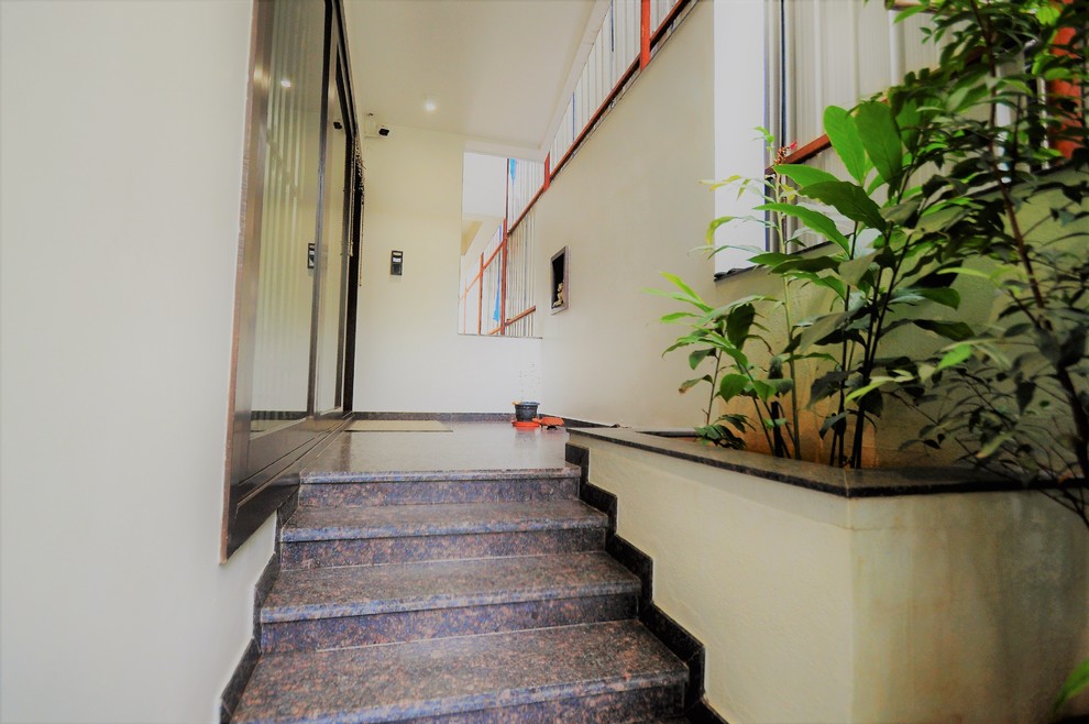 This is an example of a contemporary entrance in Bengaluru.