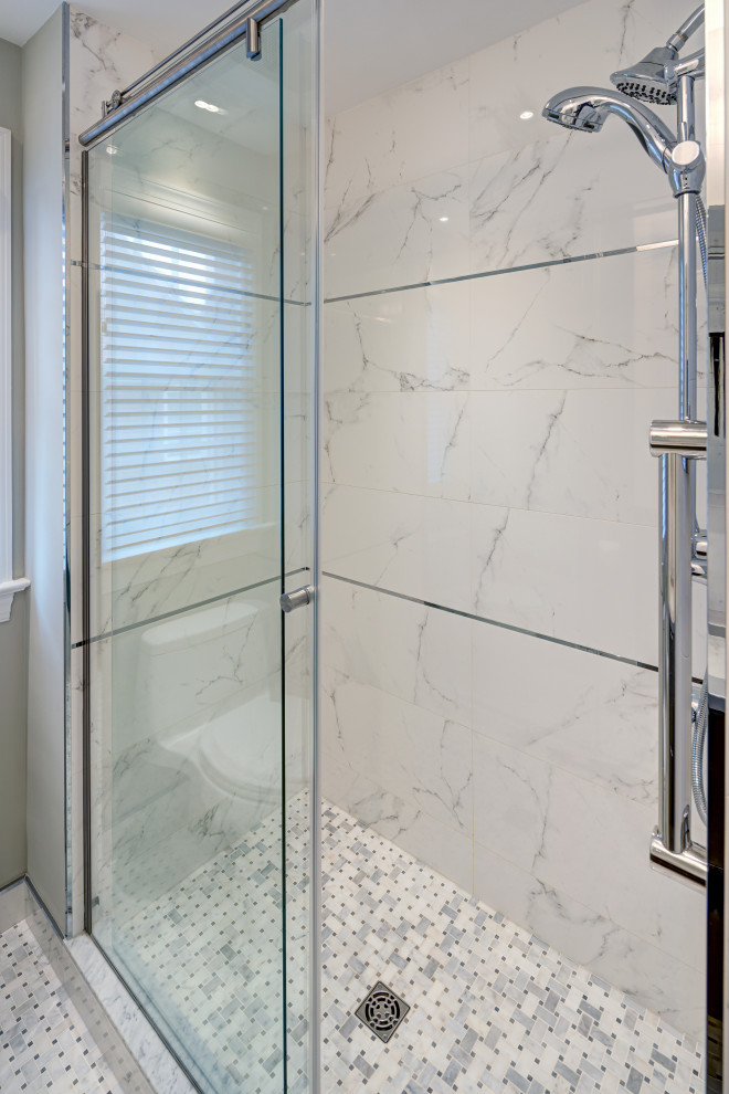 Small transitional 3/4 white tile and marble tile mosaic tile floor, multicolored floor and single-sink alcove shower photo in DC Metro with flat-panel cabinets, dark wood cabinets, a one-piece toilet, an undermount sink, quartz countertops, gray countertops, a niche, a floating vanity and gray walls