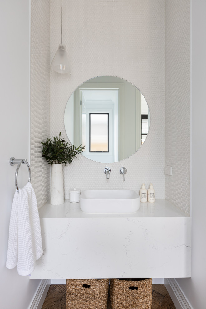Design ideas for a beach style powder room in Melbourne.