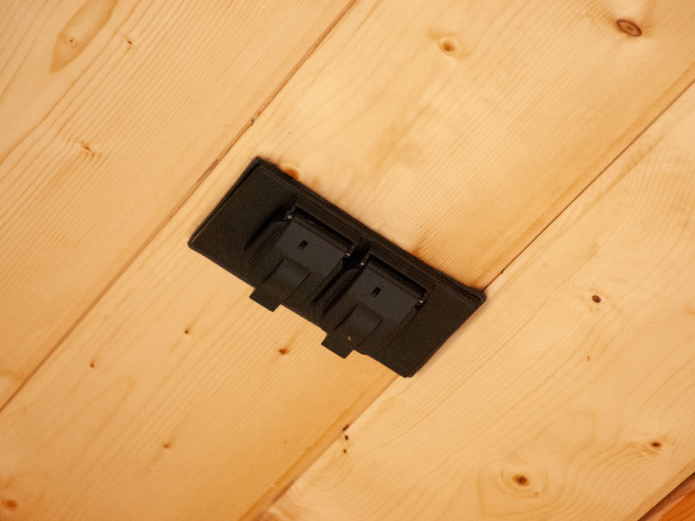 Inspiration for a mid-sized backyard deck remodel with a roof extension