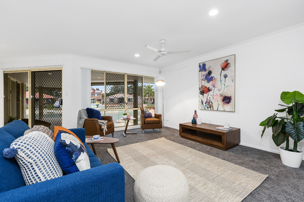 Beach style formal living room in Gold Coast - Tweed with white walls, carpet, no tv and grey floor.