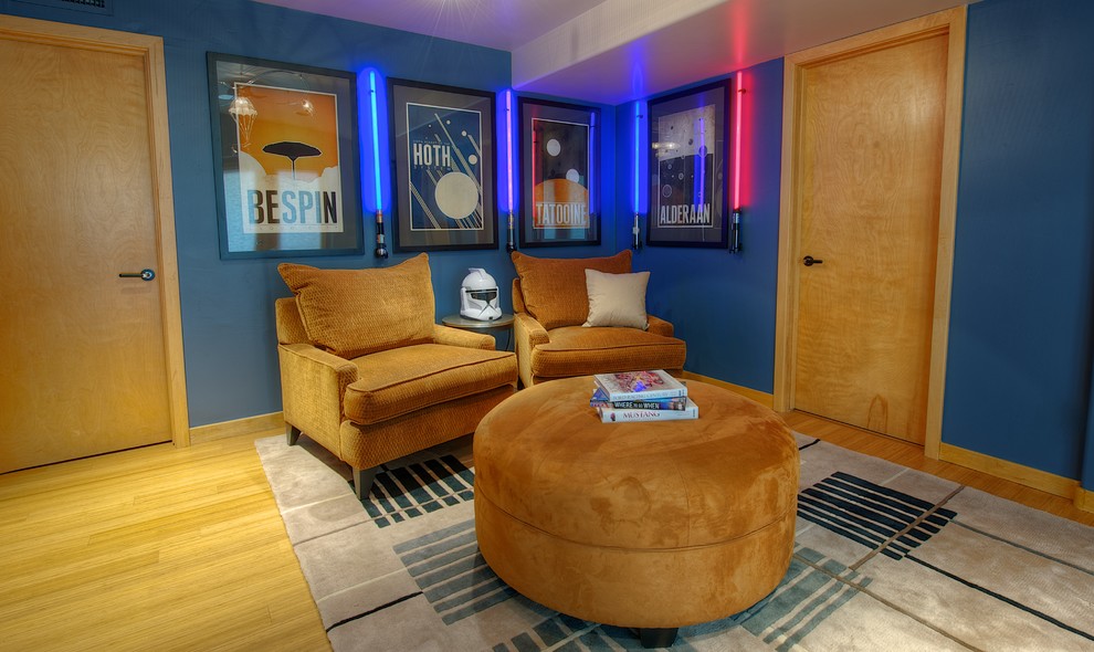 Inspiration for a contemporary enclosed family room remodel in Phoenix with blue walls