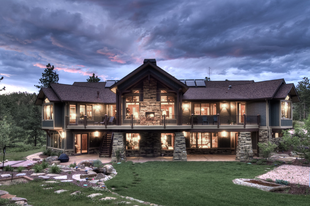 Inspiration for an arts and crafts exterior in Denver with wood siding.