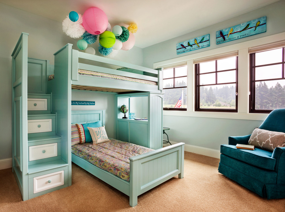 Example of a bedroom and large transitional girl carpeted kids' bedroom design in Portland with blue walls