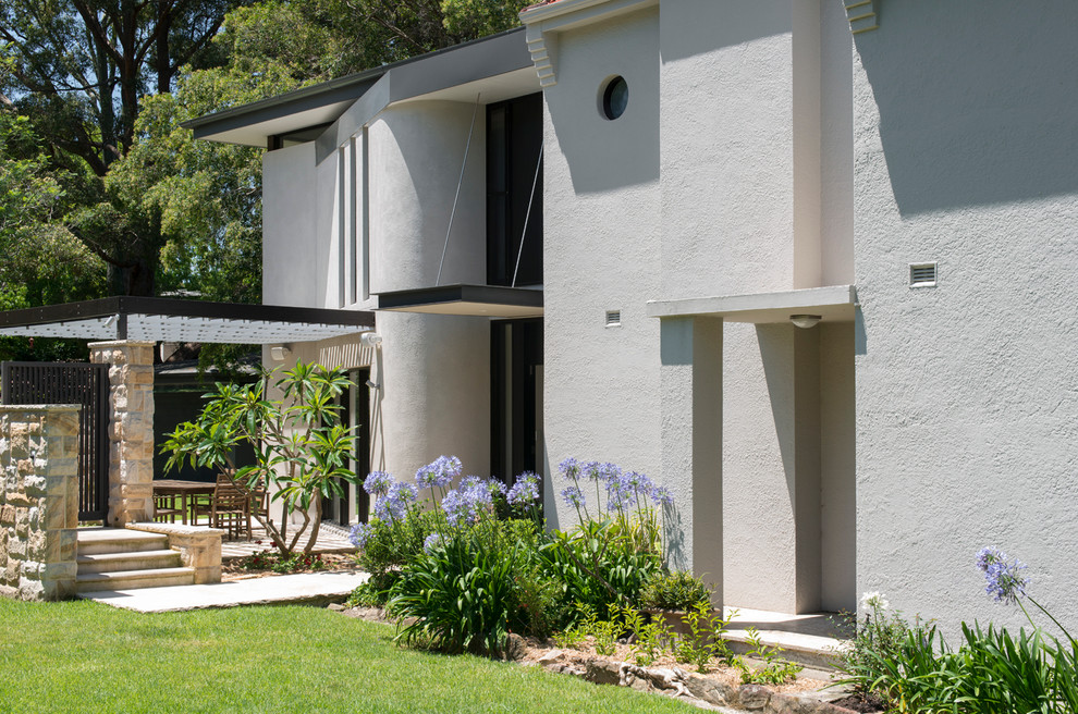 Inspiration for a contemporary two-storey exterior in Sydney.