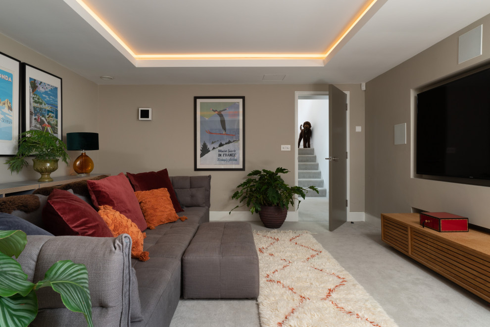 Contemporary home cinema in Devon with feature lighting.