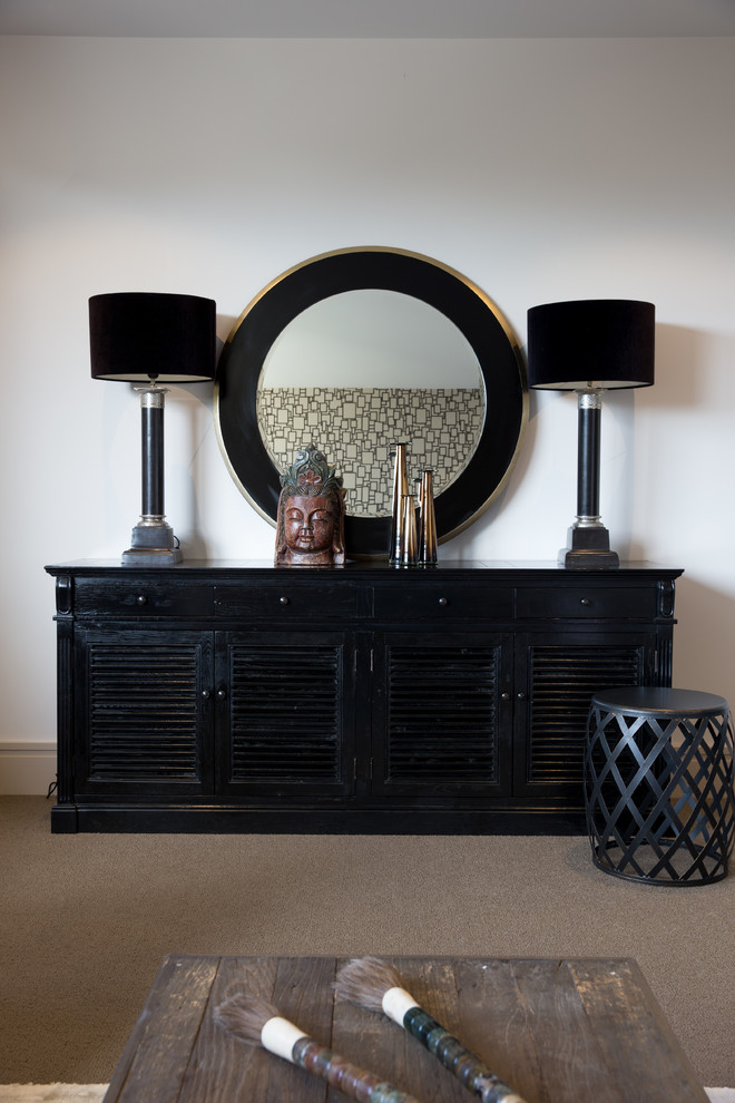 Inspiration for a modern Formal Open Concept living room in Auckland With White Walls, Carpet, No Fireplace, No TV and Brown Floor.