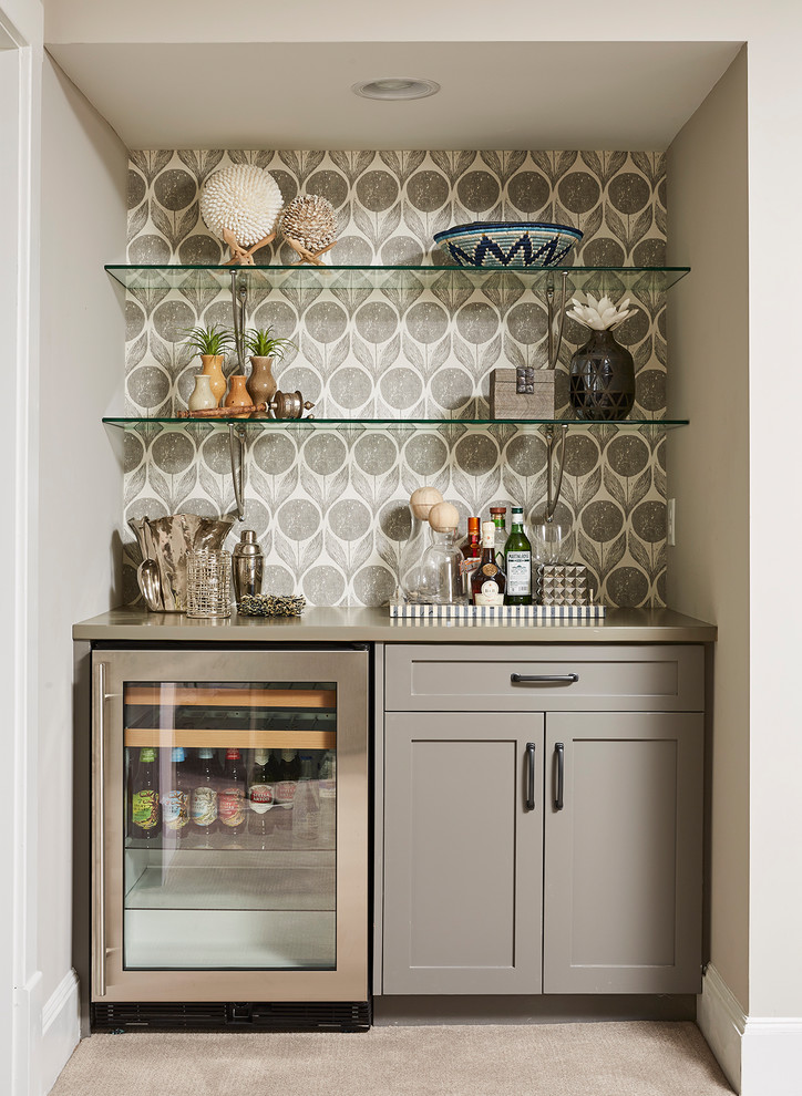 Design ideas for a transitional single-wall home bar in Minneapolis with shaker cabinets, grey cabinets, carpet, grey floor and grey benchtop.