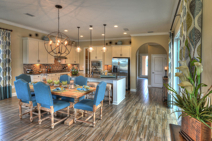 Inspiration for a small beach style dining room in Jacksonville with ceramic floors.
