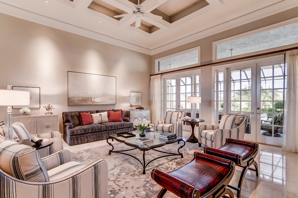 Large transitional formal enclosed living room in Miami with beige walls, marble floors, a standard fireplace, a stone fireplace surround and no tv.