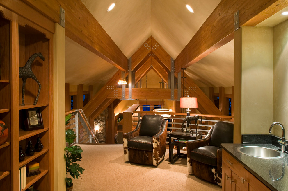 Example of a mid-sized mountain style carpeted and beige floor hallway design with beige walls