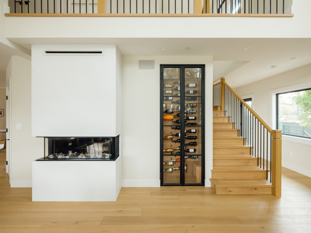 Example of a transitional home design design in Seattle