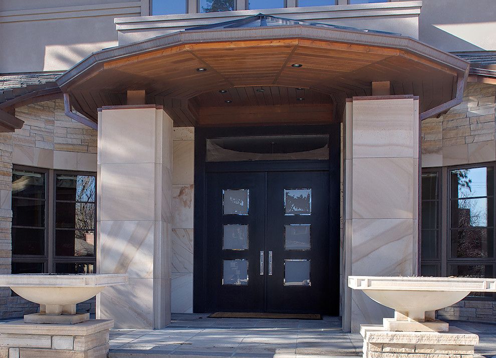 This is an example of a large contemporary front door in Denver with a double front door and a black front door.