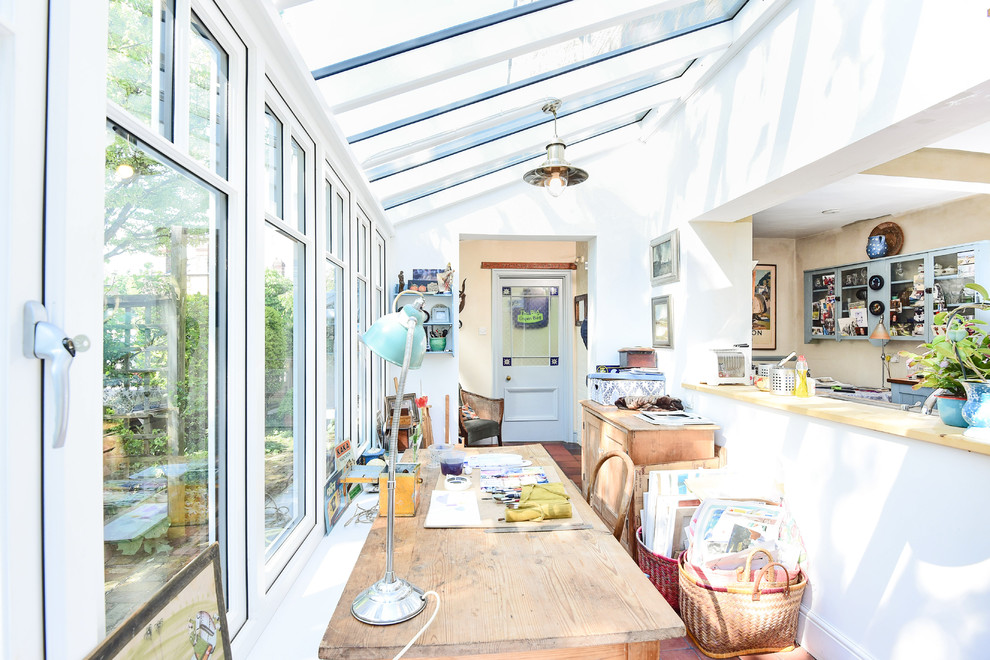 Photo of a traditional sunroom in London.