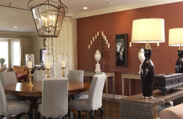 Inspiration for a large transitional medium tone wood floor great room remodel