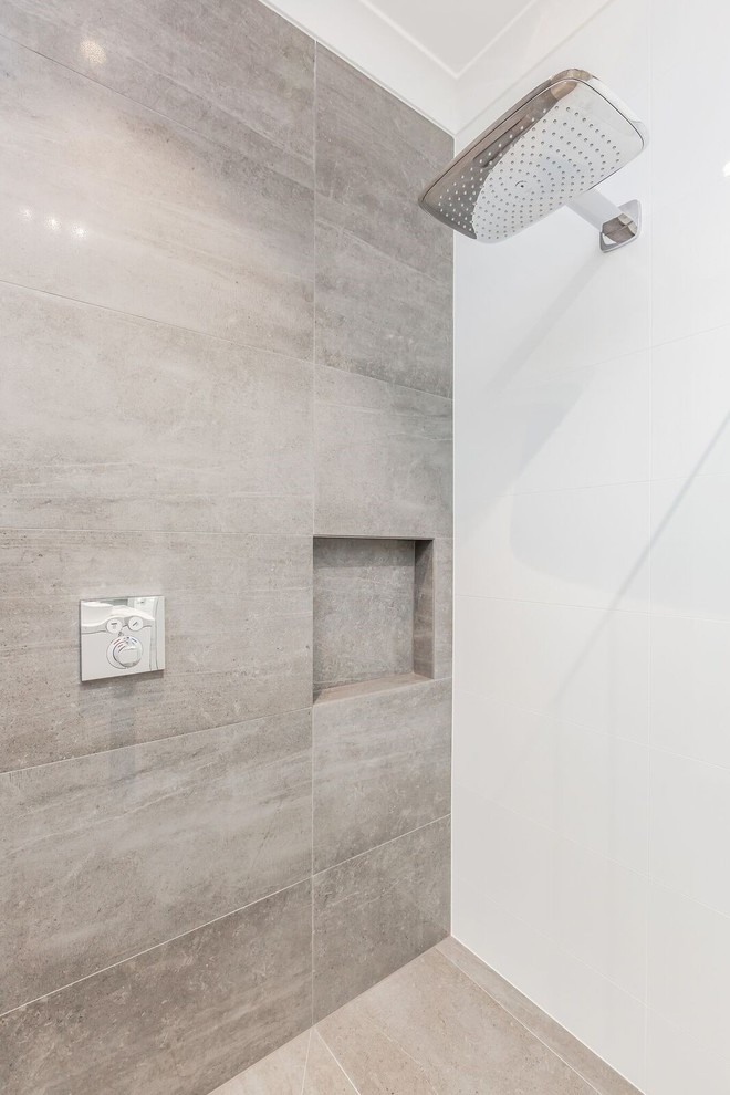 Inspiration for a large contemporary 3/4 bathroom in Adelaide with an open shower, white tile, ceramic tile, white walls, porcelain floors, brown floor and an open shower.