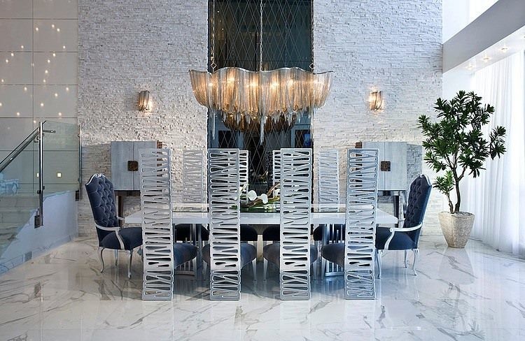 Inspiration for a large contemporary marble floor dining room remodel in Las Vegas with white walls