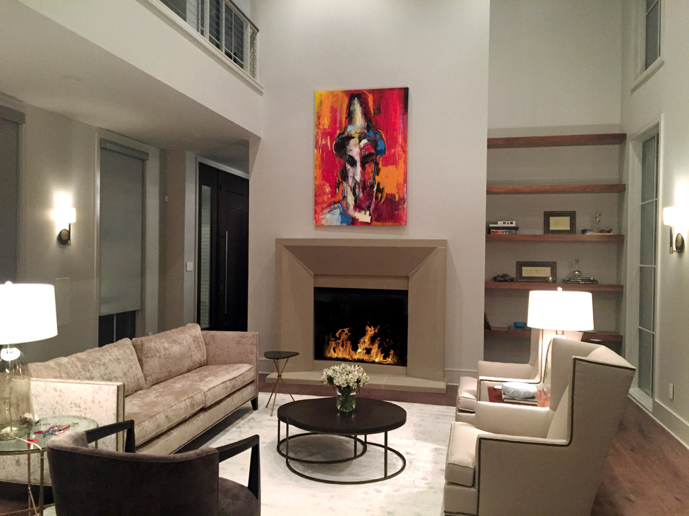 This is an example of a mid-sized contemporary open concept family room in Little Rock with white walls, bamboo floors, a standard fireplace and a concrete fireplace surround.