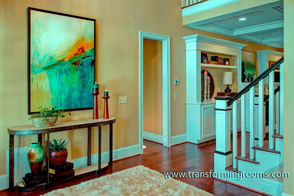 Large beach style foyer in Other with dark hardwood floors, a double front door and a dark wood front door.