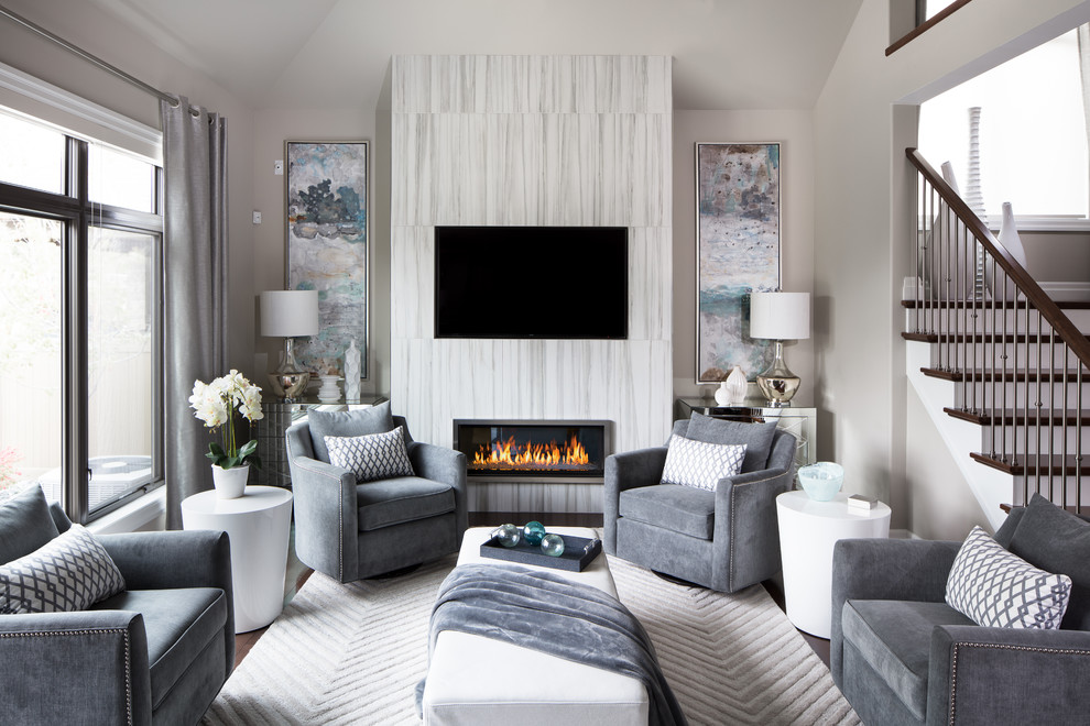 Mid-sized contemporary enclosed living room in Other with grey walls, dark hardwood floors, a ribbon fireplace, a wall-mounted tv, a tile fireplace surround and white floor.