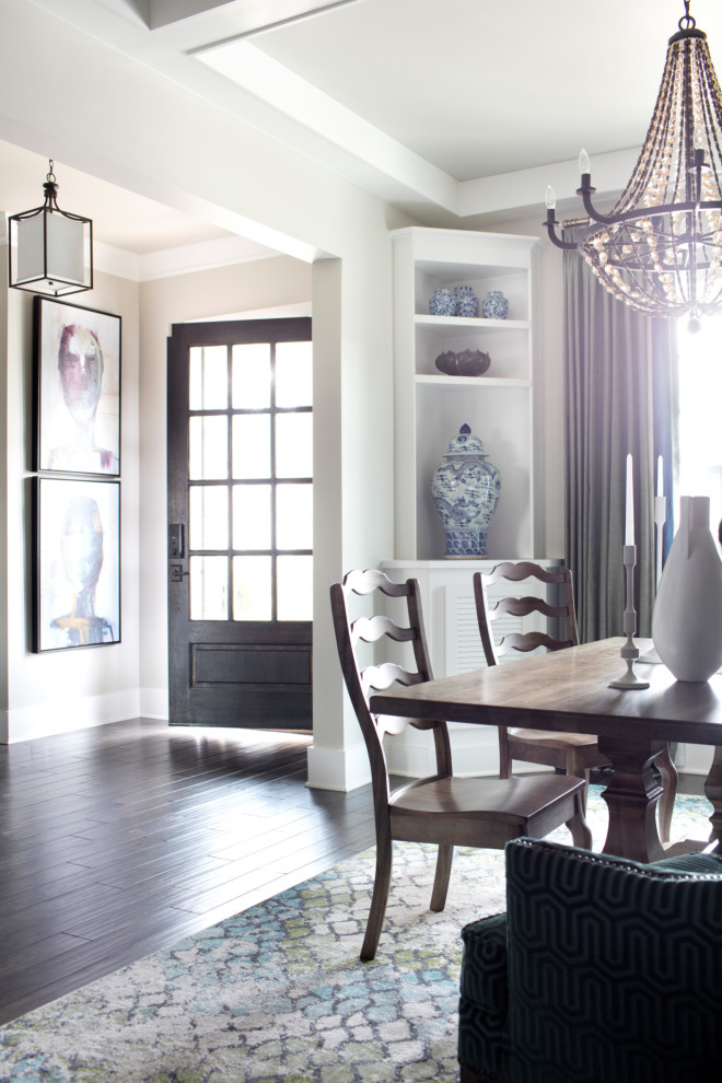 Mid-sized traditional open plan dining in Chicago with beige walls, dark hardwood floors and brown floor.