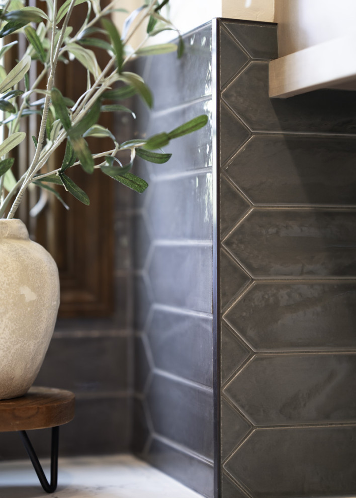 Example of a large transitional porcelain tile and gray floor eat-in kitchen design in Chicago with a farmhouse sink, recessed-panel cabinets, light wood cabinets, quartz countertops, gray backsplash, porcelain backsplash, an island and white countertops