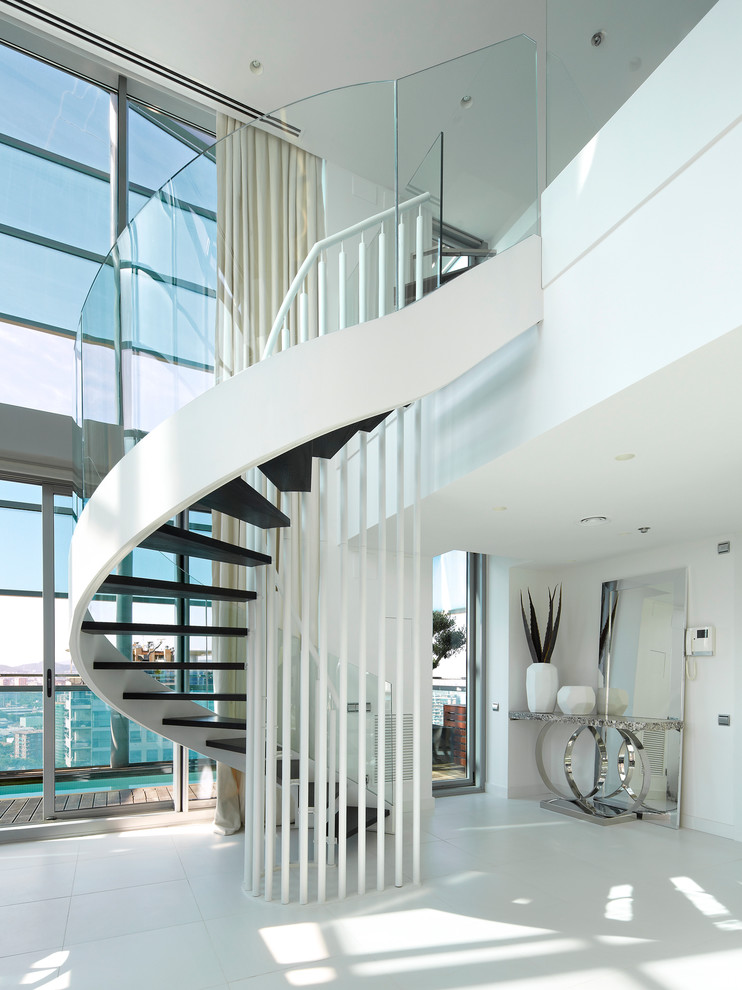 Design ideas for a large contemporary spiral staircase in Barcelona with open risers.