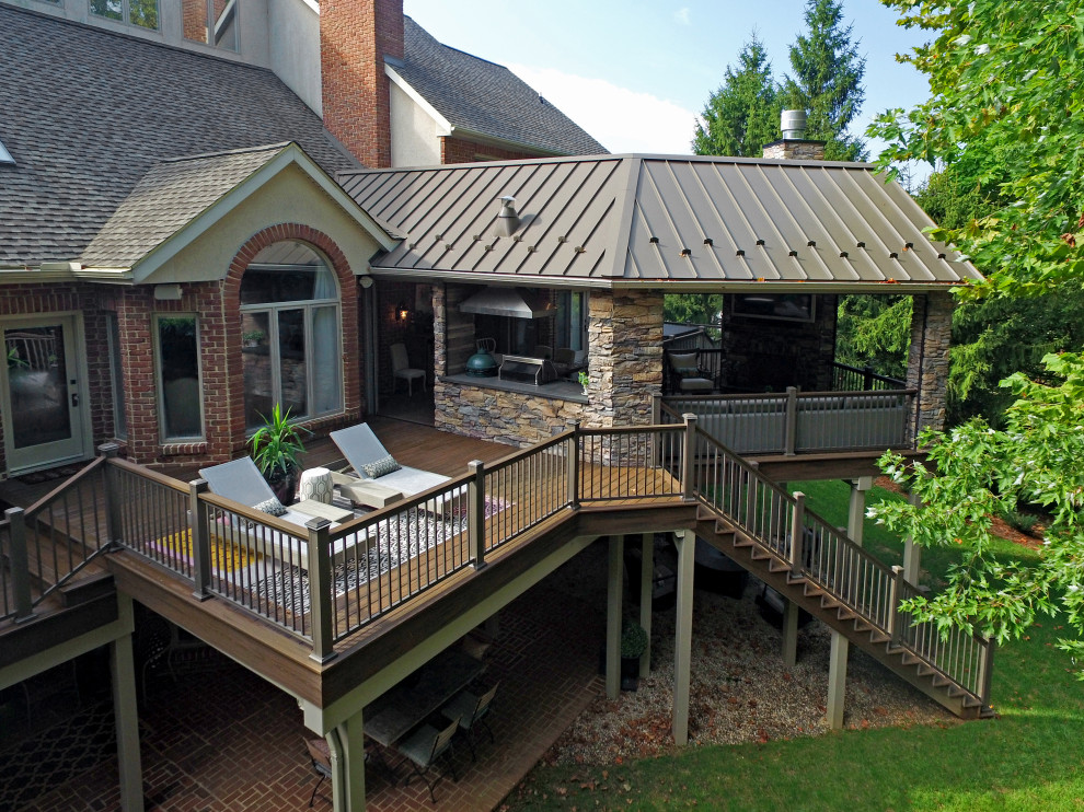 Deck - transitional backyard second story metal railing deck idea
