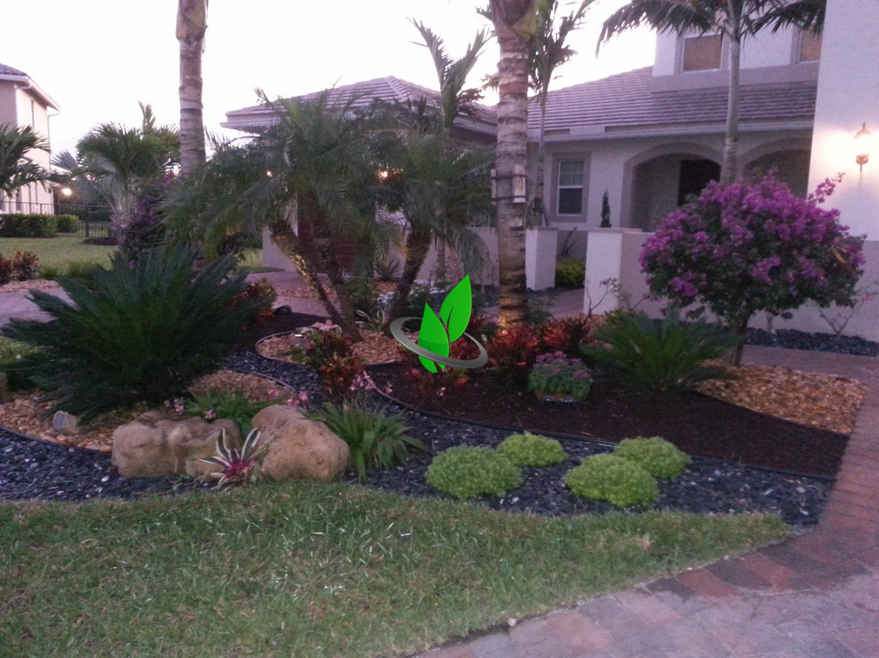 Design ideas for a front yard gravel landscaping.
