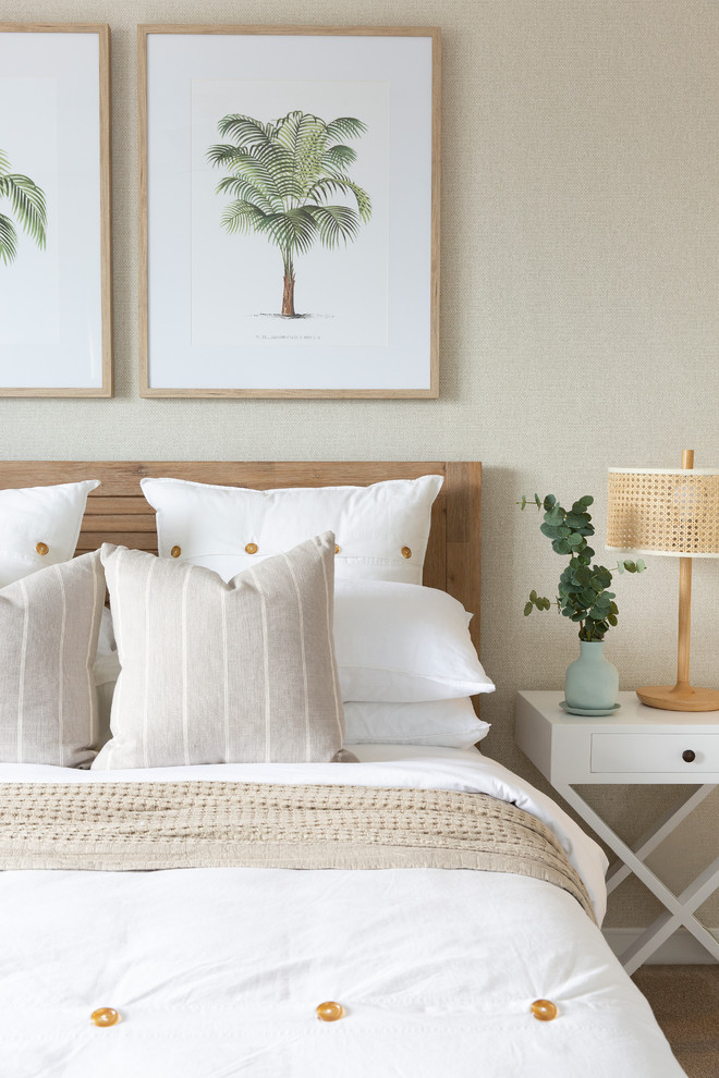 Design ideas for a mid-sized beach style guest bedroom in Gold Coast - Tweed with beige walls, carpet and beige floor.